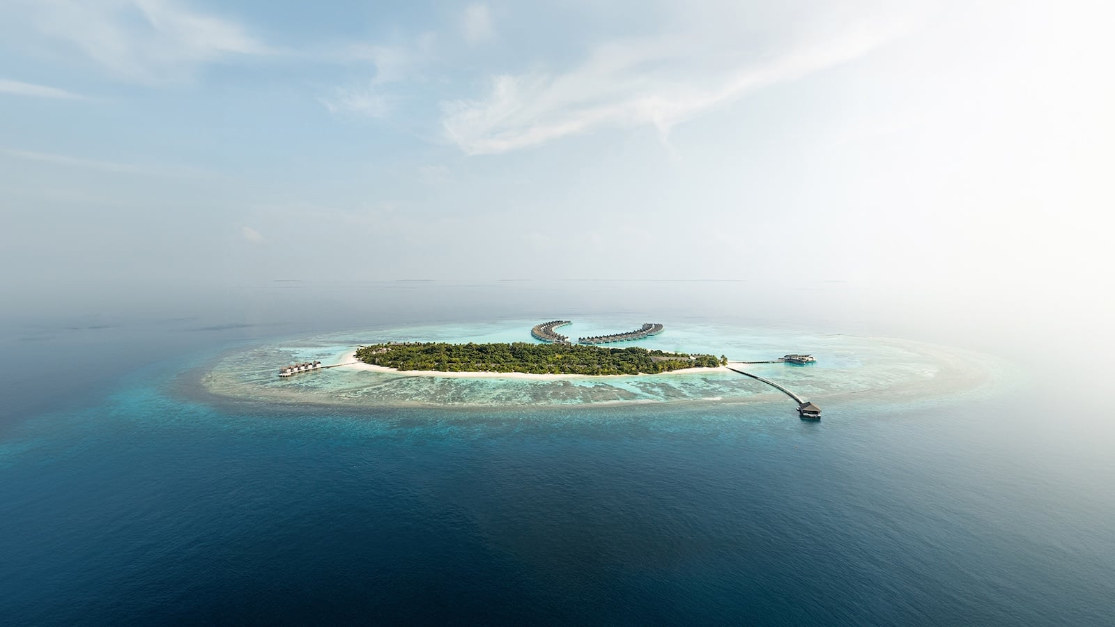 Aerial render of Mondrian Maldives overwater villas on Kuredhivaru