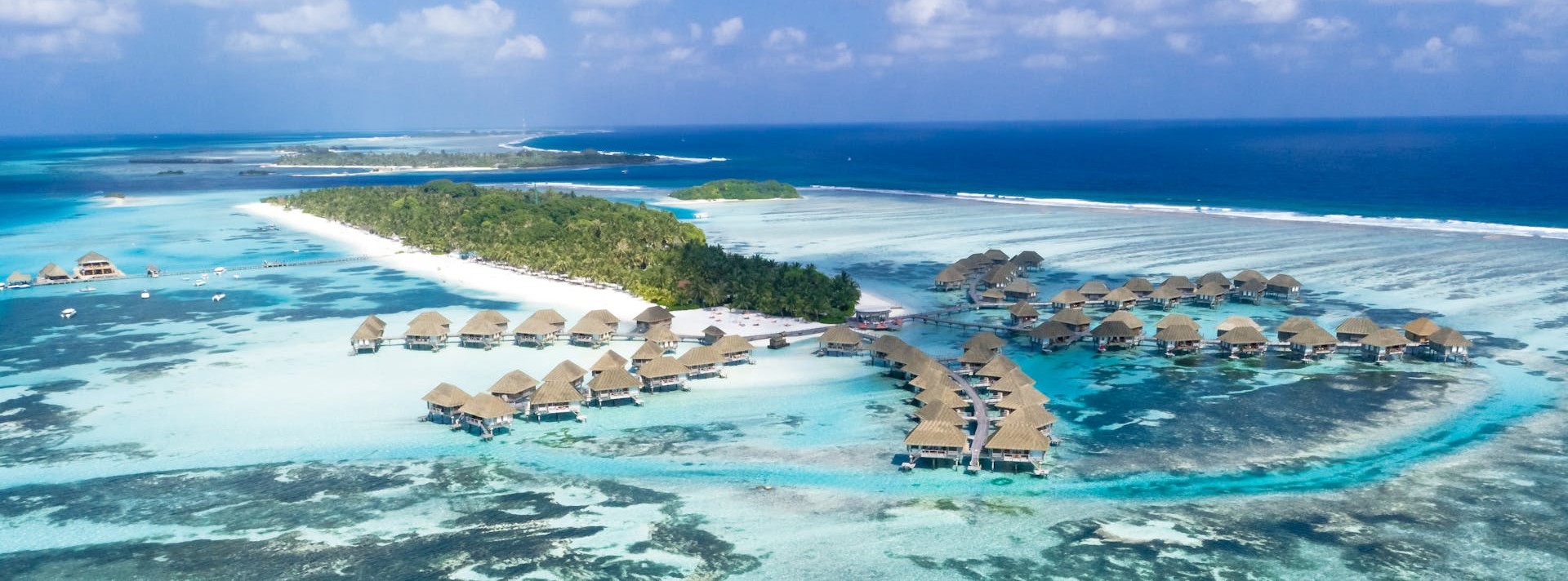 Aerial view of overwater villas in the Maldives