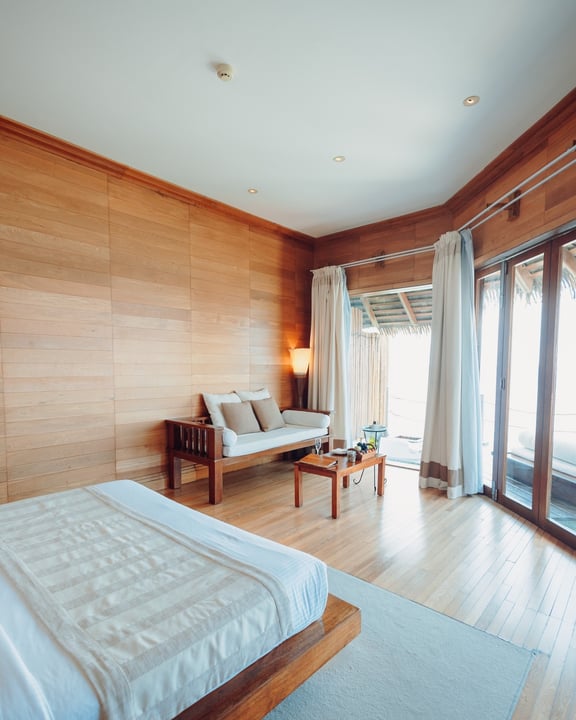 Photo by Adaaran Prestige Water Villas on April 26, 2026. May be an image of bed, headboard, mattress, bedroom, indoors and text.