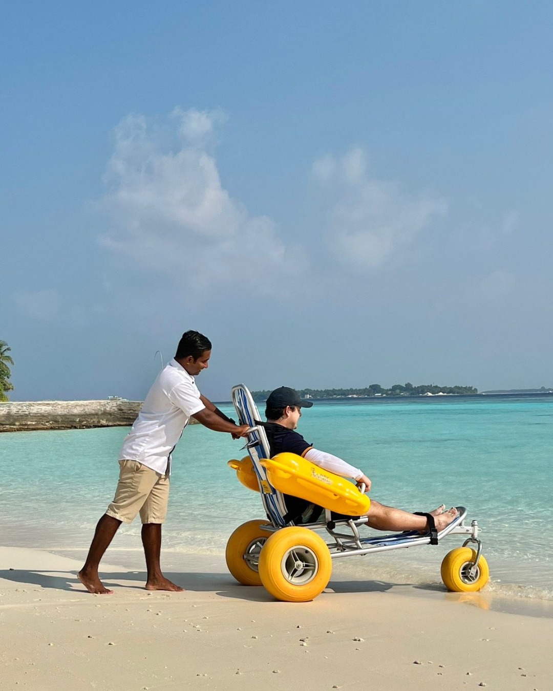 Photo by Amilla Maldives on August 09, 2026. May be an image of segway, wheelchair, carriage, wagon, scooter, beach and text.