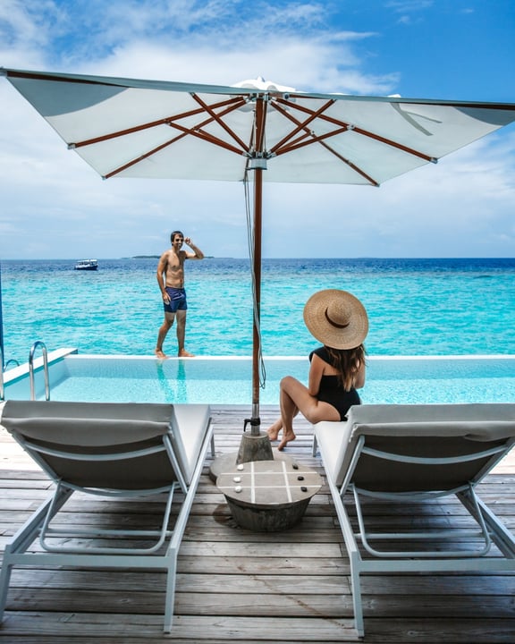 Photo by Amilla Maldives on August 10, 2026. May be an image of umbrella, chaise longue, deck chair, parasol, pool, outdoors, cabana and text.