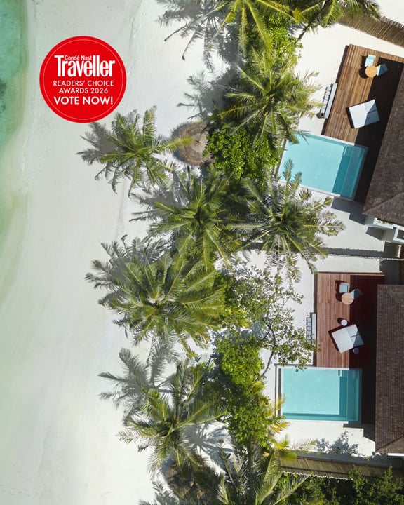 Photo by Anantara Veli Maldives Resort on May 02, 2026. May be an image of deck chair, chaise longue, palm trees, outdoors and text that says "Traveller Condé READERS' AWARDS2026 CHOICE AWARDS VOTE VO