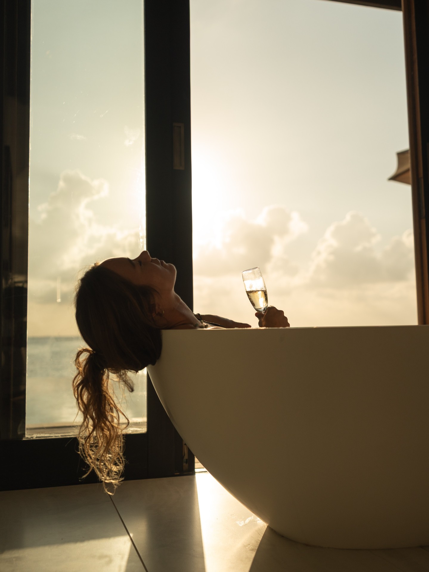 Photo by Anantara Veli Maldives Resort on August 12, 2026. May be an image of shower, bath, wine glass, tap and text.