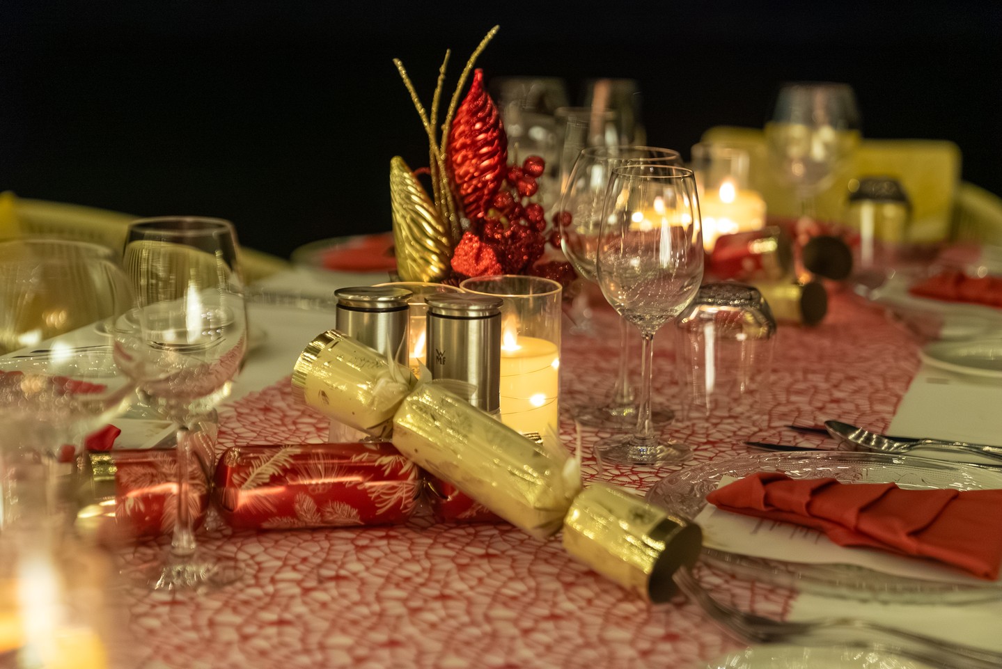 Photo by Anantara Veli Maldives Resort on August 01, 2026. May be an image of napkin ring, candle holder, table, dining table, napkin, cutlery, place mat, tablecloth, candle and text.