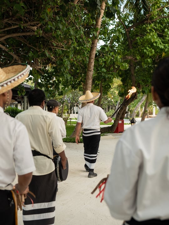 Photo by Anantara Veli Maldives Resort on August 05, 2026. May be an image of one or more people, barong, sarong and text.