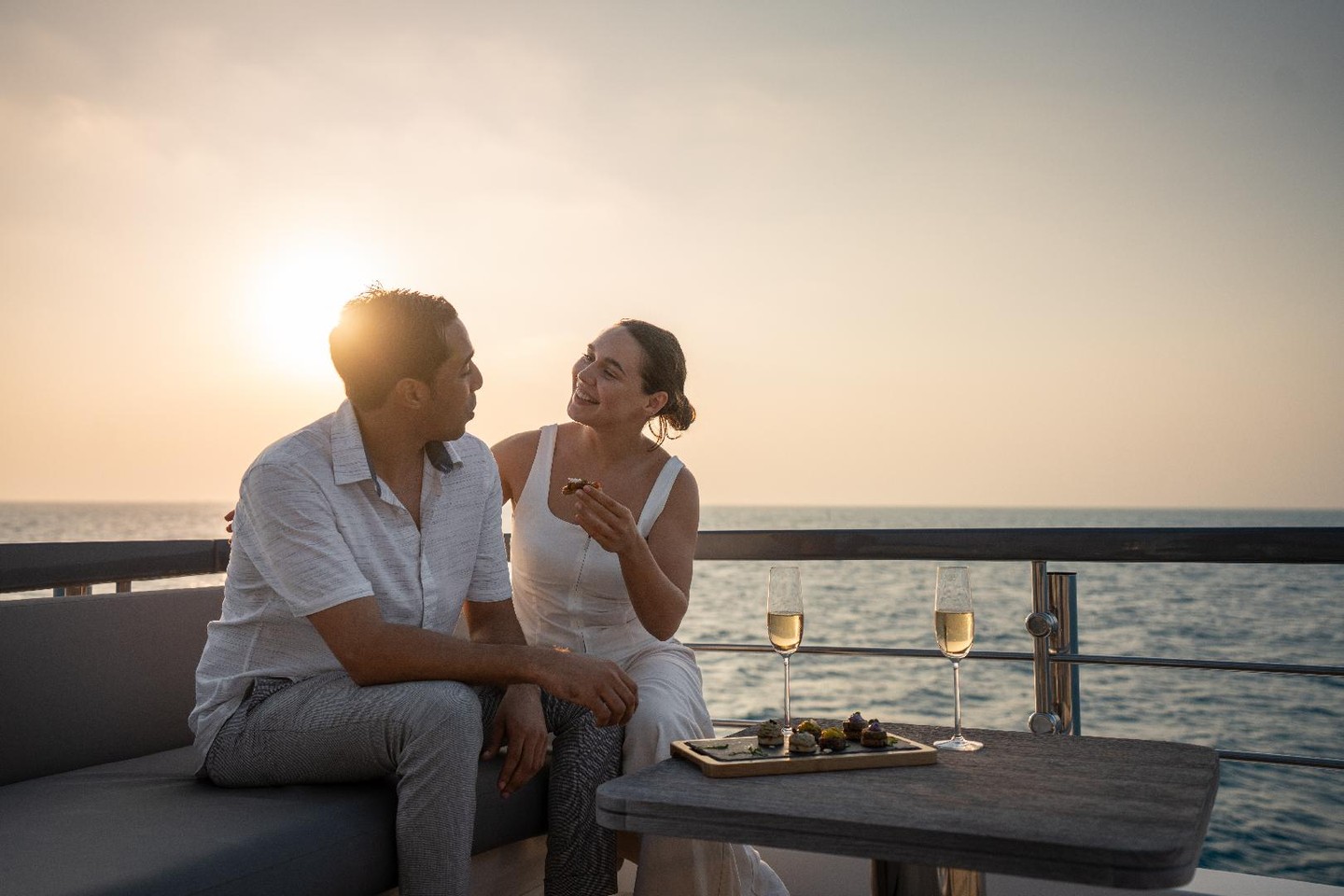 Imagine this.

The sun is beginning to disappear, painting the Maldivian horizon in shades of gold and coral. You step aboard Raaya, the sea stretching endlessly around you, with nothing but the sound