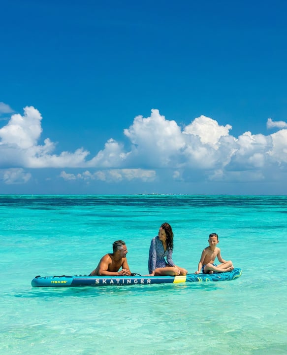 Photo by Atmosphere Kanifushi Maldives on May 04, 2026. May be an image of swimming, jet ski, kayak, raft, body of water and text.