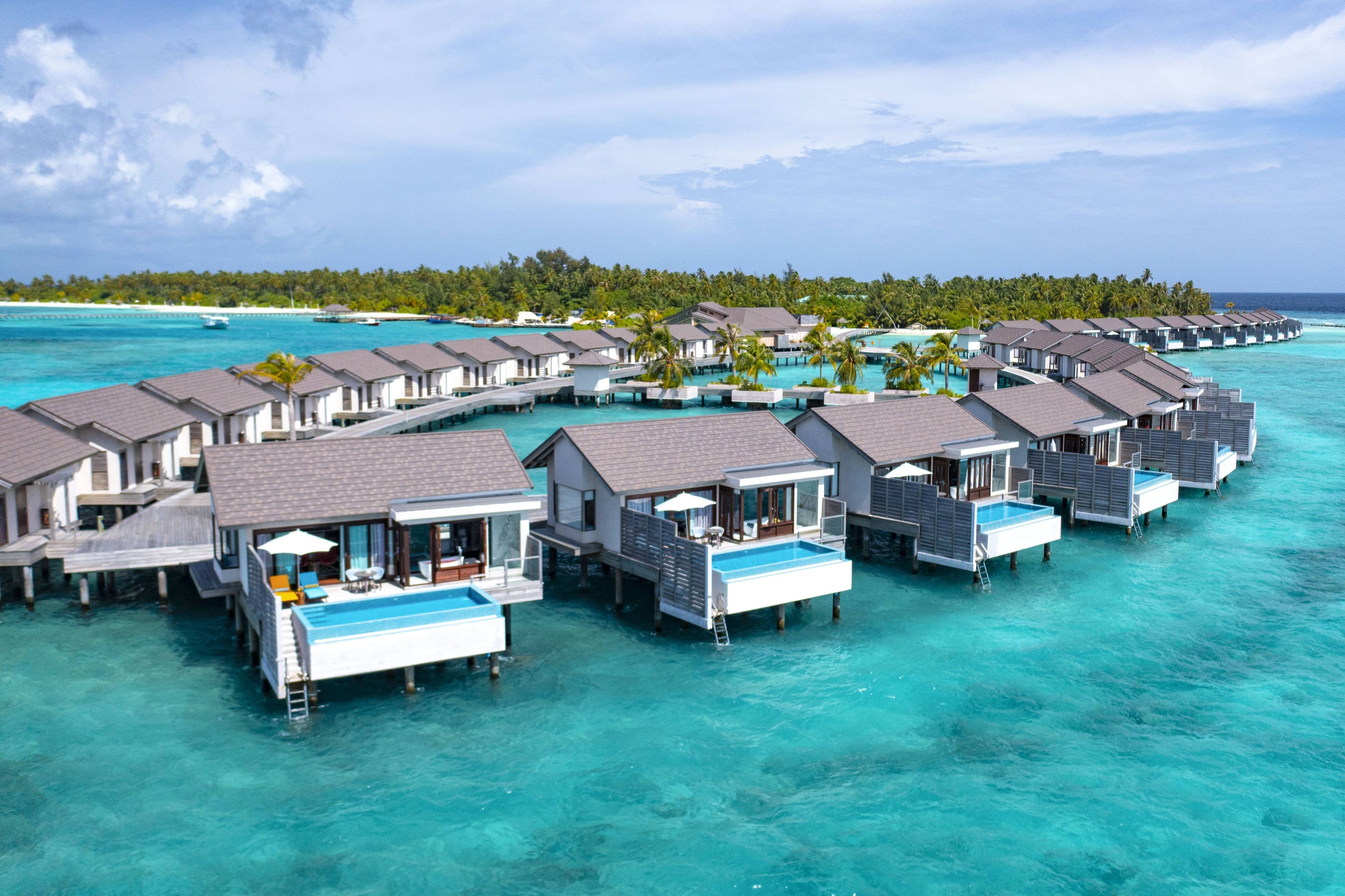 Sunset Water Villa with Pool im Atmosphere Kanifushi Maldives