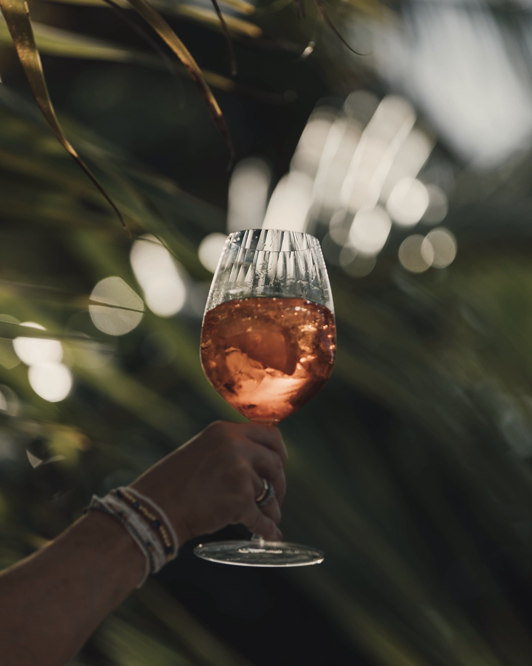 Photo by Baglioni Maldives Luxury All-Inclusive on August 24, 2026. May be an image of champagne, wine glass, palm trees and text.