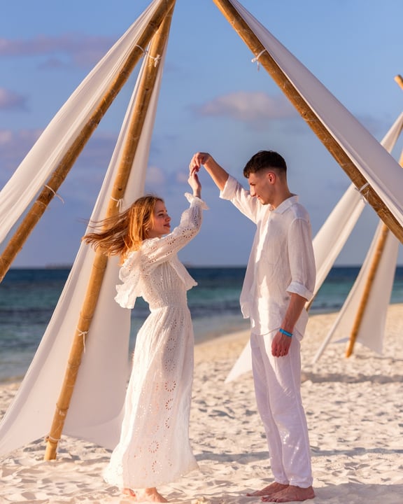 Photo by Bandos Maldives on May 24, 2026. May be an image of macramé, tent, parasol, wedding, outdoors and text.