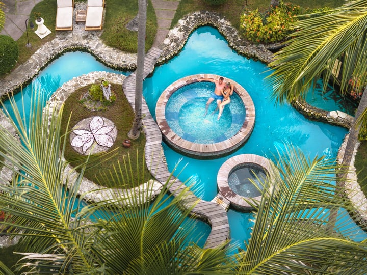 Wrapped in palms and unwind in our garden sanctuary🌴🌺
 #bandosmaldives #maldives #coupletravel #tropical