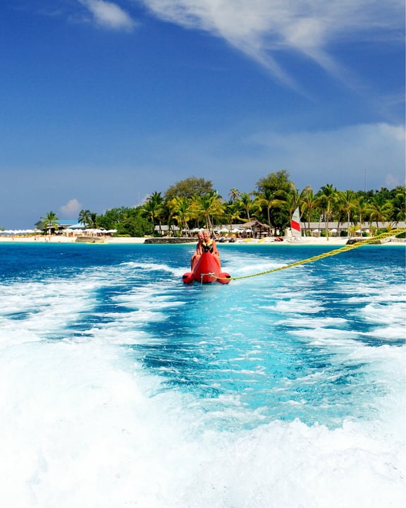 Photo by Centara Ras Fushi Resort & Spa Maldives in Centara Ras Fushi Resort & Spa Maldives with @explorecentara. May be an image of jet ski, parasail, raft, speedboat and text.
