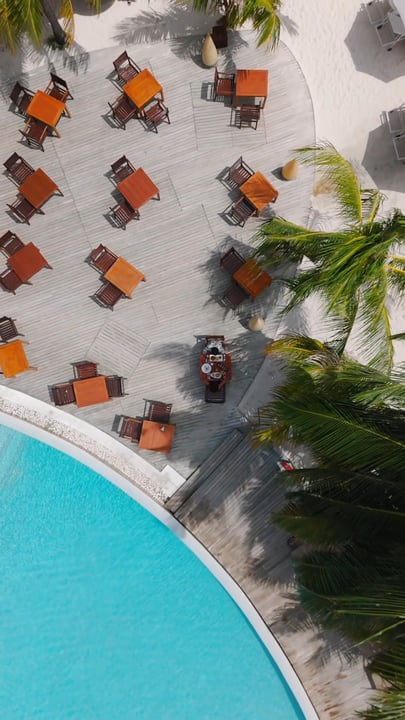From above, the perfect island lunch spot reveals itself, palm shade, turquoise waters, and a table waiting. 🌴✨

#CentaraRasFushi #Centara #CentaraThePlaceToBe #ExperienceCentara #Maldives #MaldivesR