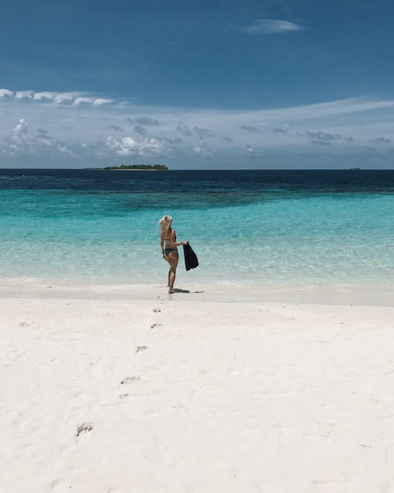 Photo by Coco Bodu Hithi on June 18, 2026. May be an image of sarong, ocean, beach and text.