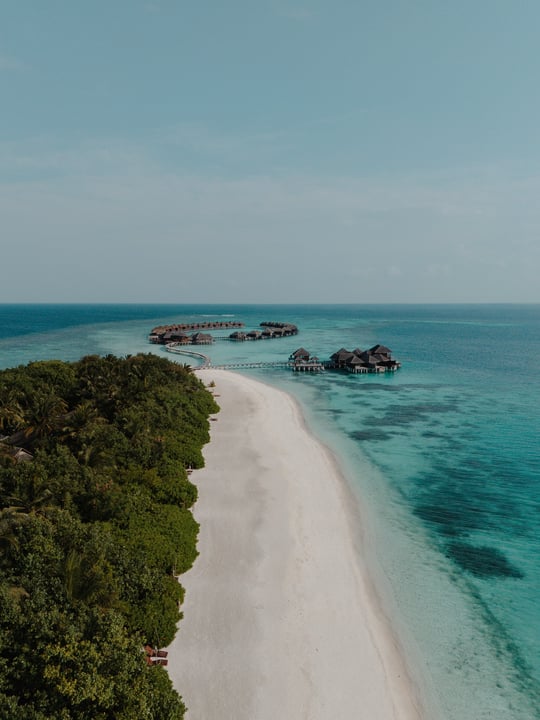Photo by Coco Bodu Hithi on July 30, 2026. May be an image of beach, ocean, horizon and text.