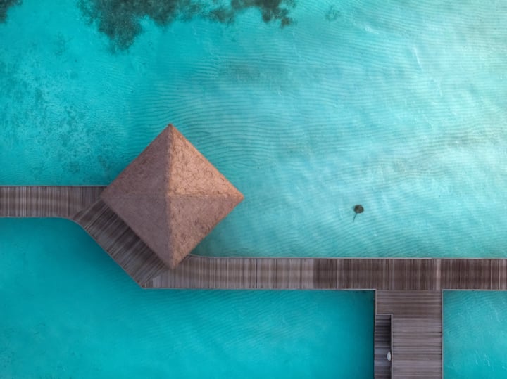 Foto von COMO Maalifushi vom 05. Juli 2026. Zeigt möglicherweise Wasser und Text.