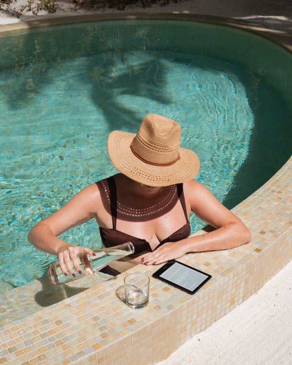 Photo by Conrad Maldives Rangali Island on August 12, 2026. May be an image of towel, chaise longue, pool and text.