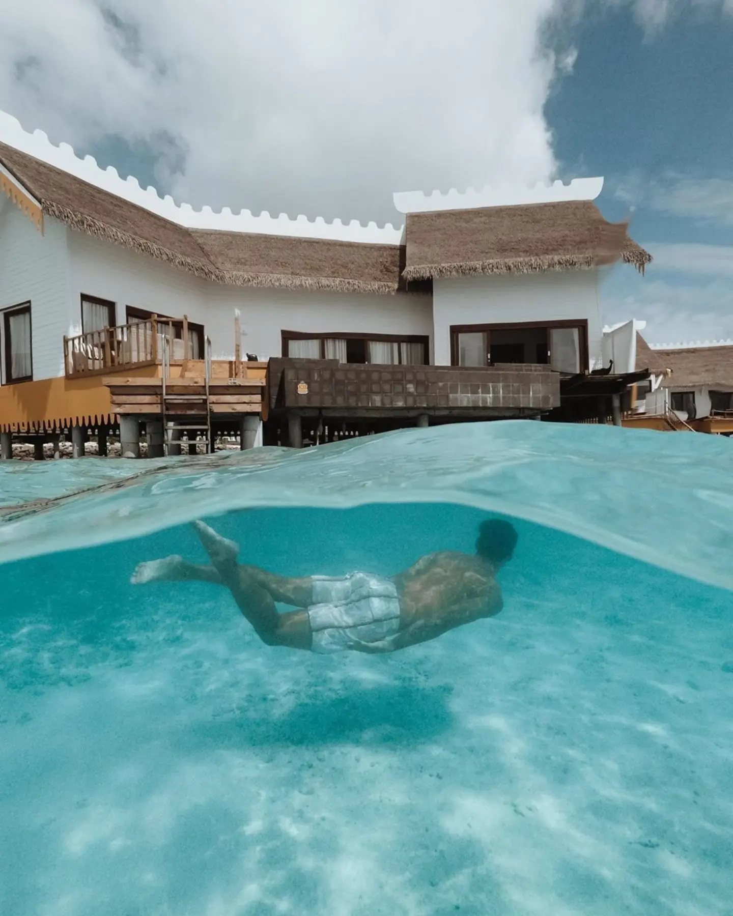 Foto von SAii Lagoon Maldives, Curio Collection by Hilton am 16. Juli 2026. Möglicherweise ein Bild von Schwimmen, Schnorchel, Pool, Cabana und Text.