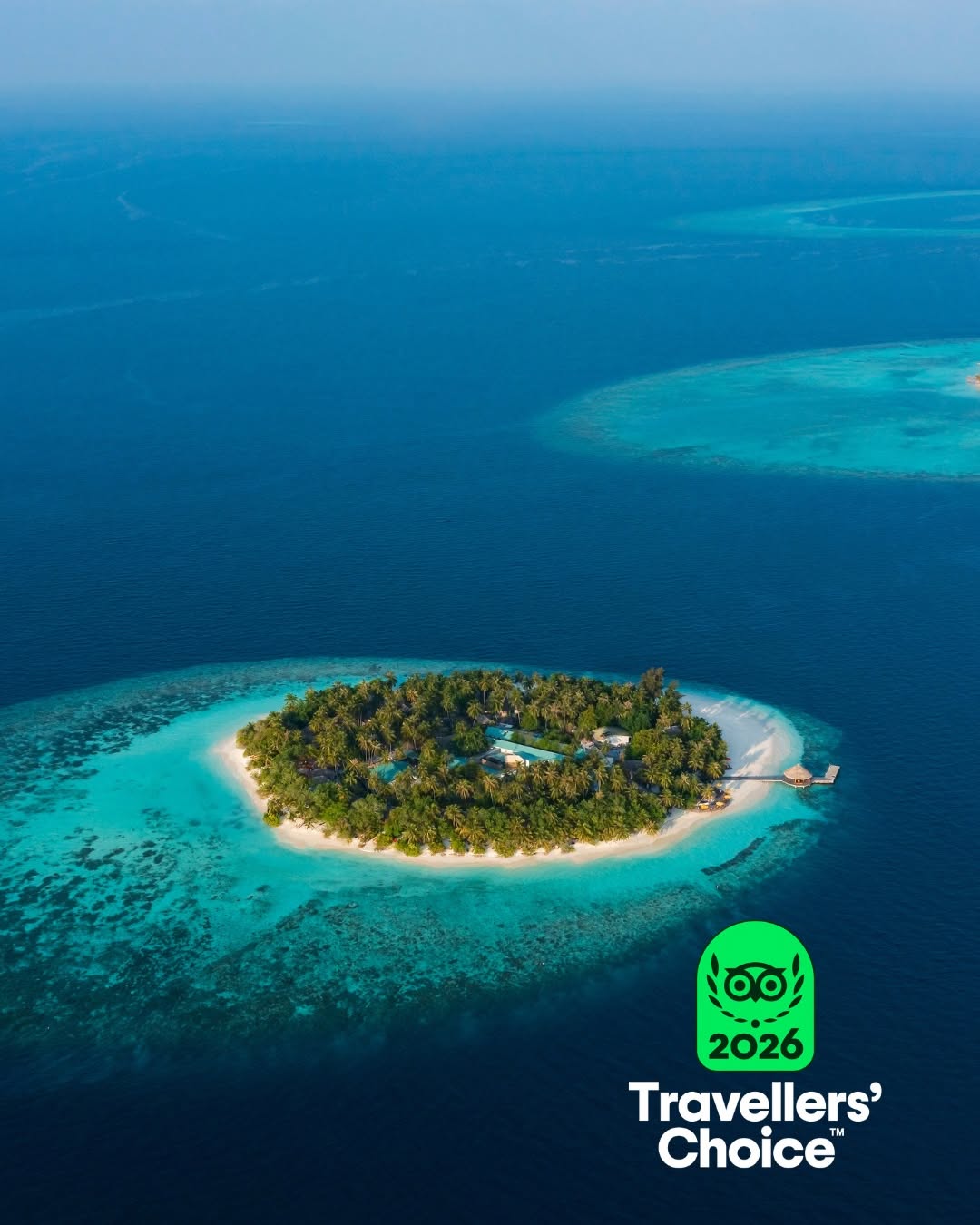 Foto di Dhawa Ihuru del 12 luglio 2026. Potrebbe essere un’immagine di orizzonte, oceano, acqua e testo che dice "2026 Travellers' Choice™".