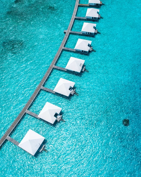 Photo by Diamonds Athuruga on June 17, 2026. May be an image of swimming, chaise longue, deck chair, pool, cabana and text.