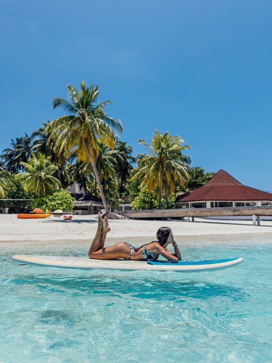 Photo by Diamonds Thudufushi in Diamonds Thudufushi Beach and Water Villas. May be an image of surfboard, kayak, ocean, beach, palm trees and text.