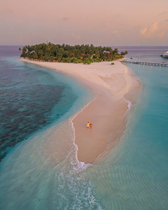 Photo by Diamonds Thudufushi on July 27, 2026. May be an image of ocean, beach, twilight, horizon, coast and text.