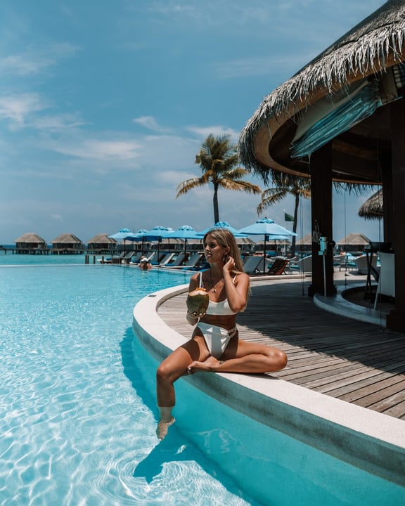 Photo by Dusit Thani Maldives on August 05, 2026. May be an image of pool, water, outdoors, cabana and text.