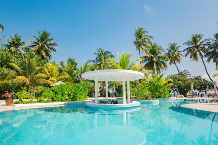 Photo by Equator Village Maldives on June 03, 2026. May be an image of chaise longue, pool, cabana and text.