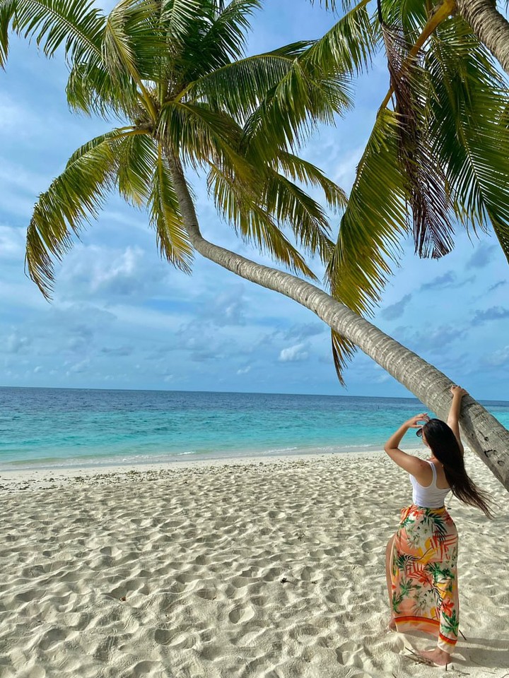 Foto von Filitheyo Island Resort vom 16. Juli 2026. Zeigt möglicherweise Sarong, Strand, Ozean, Palmen und Text.