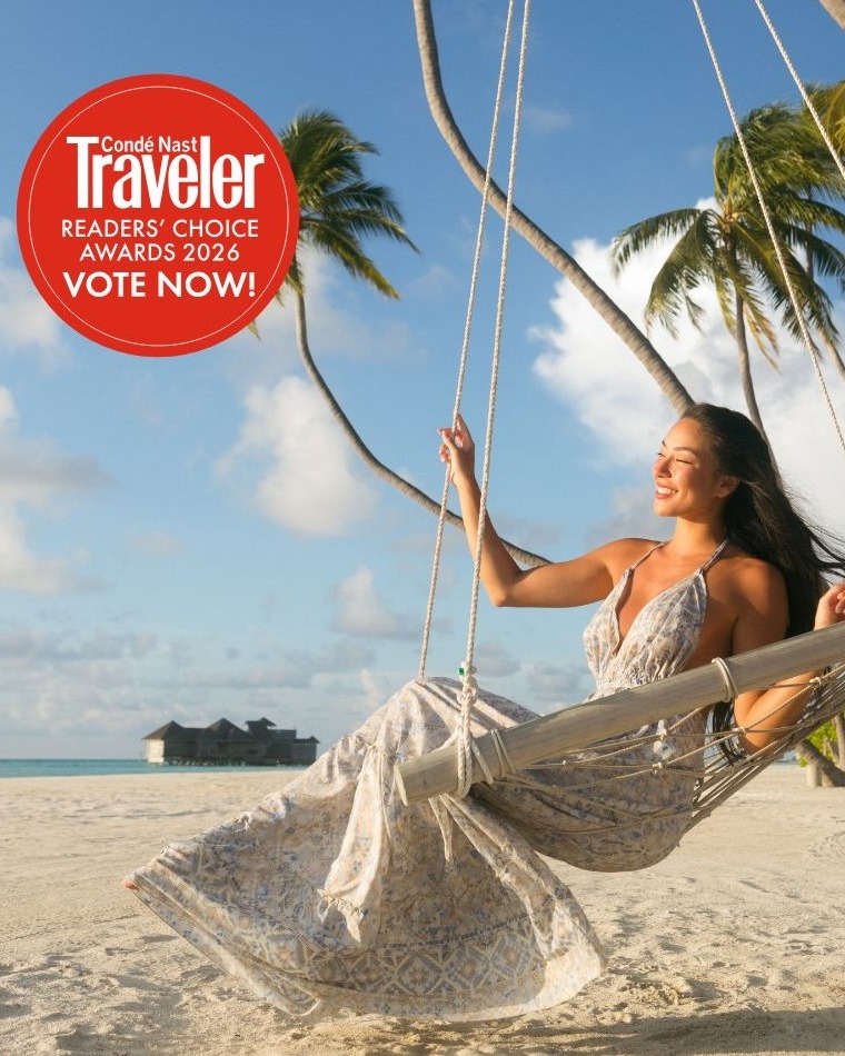 Photo by Gili Lankanfushi, Maldives in Gili Lankanfushi, Maldives. May be an image of magazine, hammock and text that says "Traveler Nast Condé READERS'CHOICE READERS' CHOICE AWARDS 2026 VOTE VOTENOW!