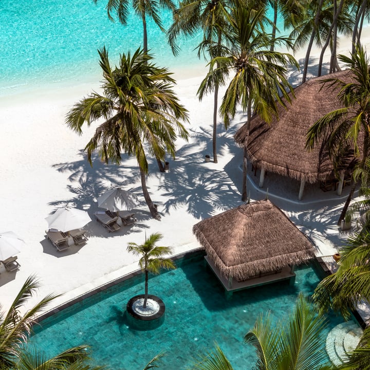 Photo shared by Ismail Niyaz Mohamed on August 09, 2026 tagging @gili.lankanfushi, and @gilimemories. May be an image of beach, cabana and text.