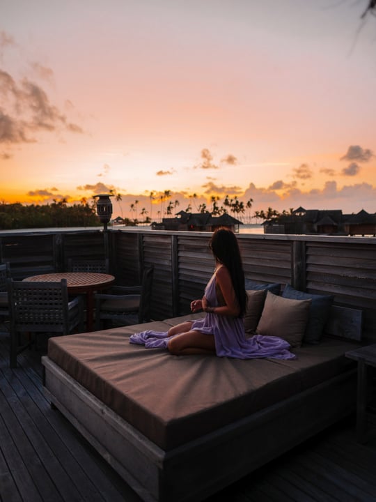 Photo shared by Steffi | Travel Creator & Photographer on August 11, 2026 tagging @gili.lankanfushi, and @maledivenreisen. May be an image of twilight, horizon, water and text.