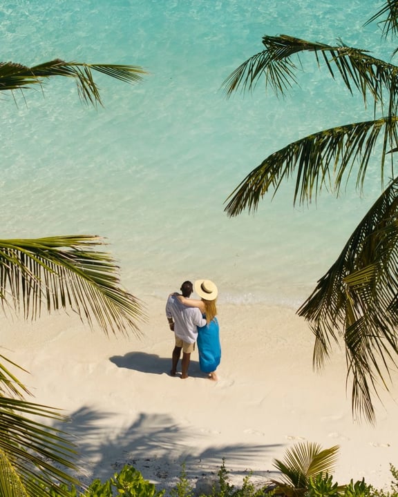Photo by Cinnamon Hakuraa Huraa on June 16, 2026. May be an image of one or more people, beach, body of water, palm trees and text.