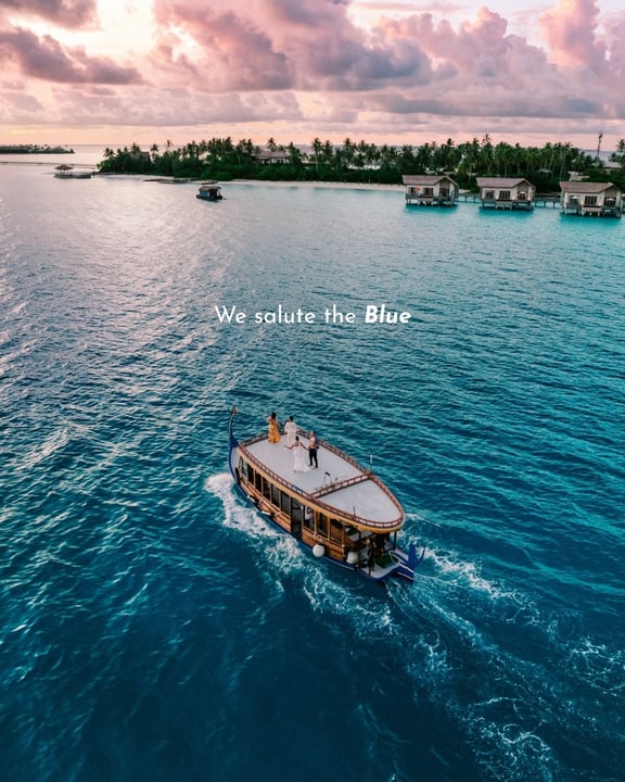 Photo by Hard Rock Hotel Maldives on August 03, 2026. May be an image of sail, ship, speedboat, raft, ocean, horizon and text that says "We salute WesalutehBlue the Blue".