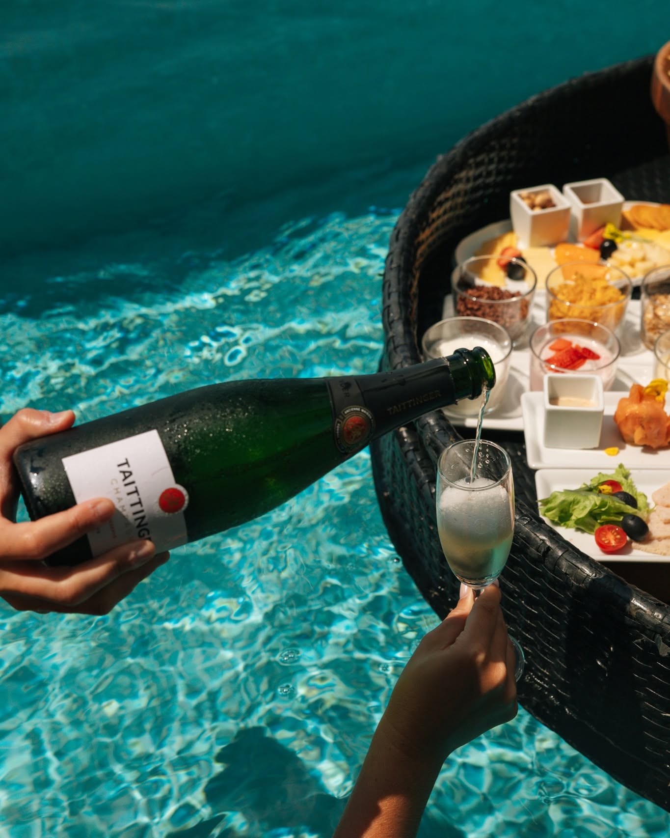 Photo by Heritance Aarah on May 04, 2026. May be an image of champagne, bottle and text that says "CHAM CHAM TAITTI".