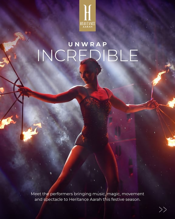 Photo by Heritance Aarah on August 12, 2026. May be an image of dancing, fire, poster, magazine, costume and text that says "H HEAITANCE AARAH 祝！ UNWRAP INCREDIBLE Meet the performers mers bringing mu