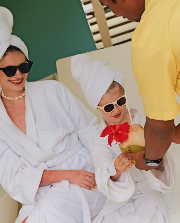 Photo by Holiday Inn Resort Maldives on August 10, 2026. May be an image of dressing gown, headscarf, robe, glasses, cabana and text.