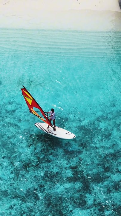 Our windsurfing introduction offers a simple and enjoyable way to learn the fundamentals while taking in the beauty of the lagoon. Would you try this out?

#Maldives #VisitMaldives #Windsurfing #Resor