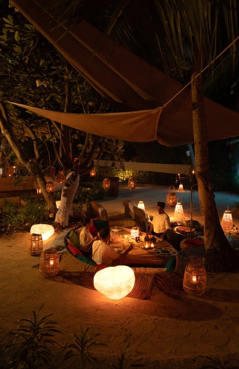 Photo by Huvafen Fushi Maldives on June 17, 2026. May be an image of lantern, candle, outdoors, night and text.