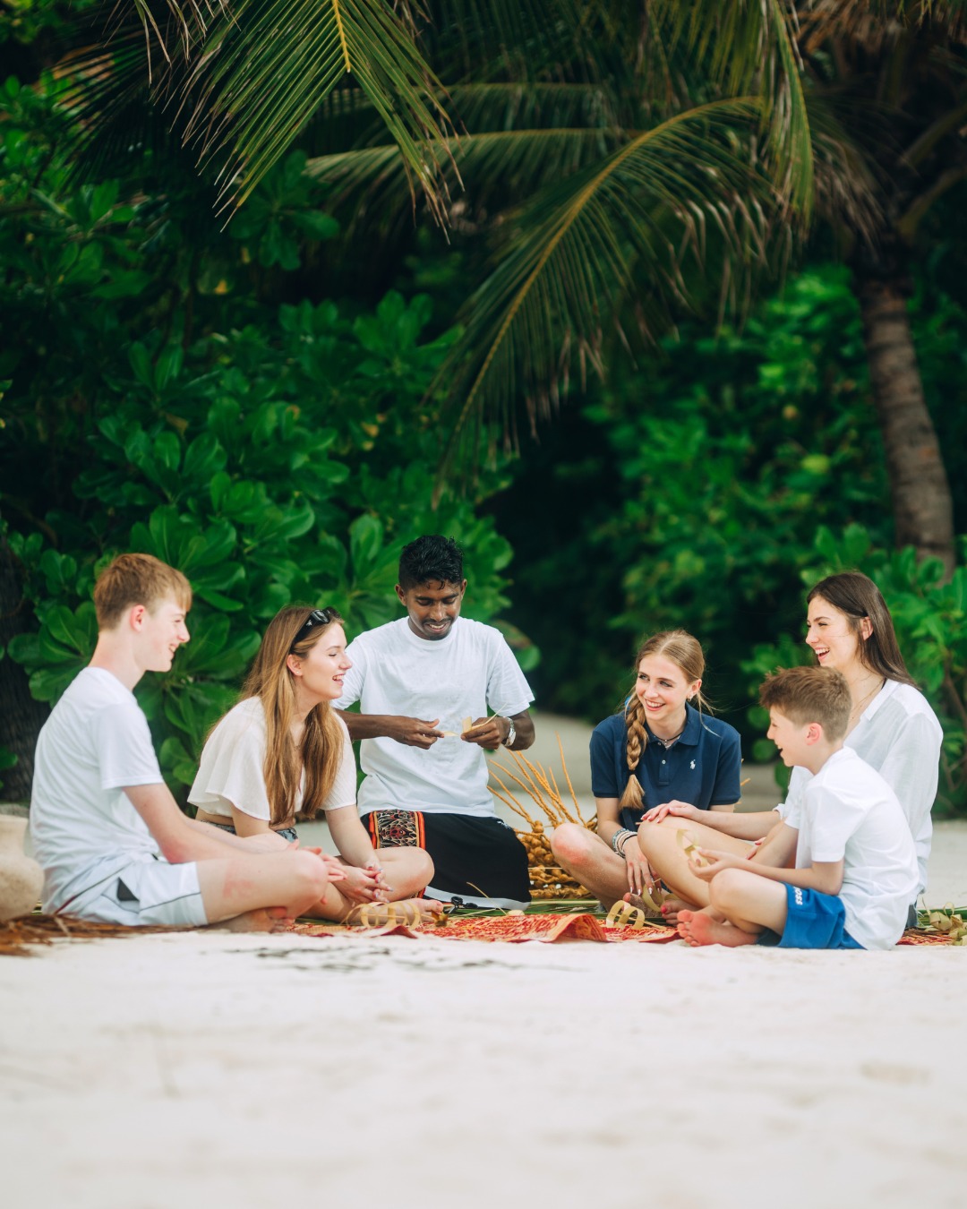 Photo by InterContinental Maldives on August 06, 2026. May be an image of one or more people, beach, picnic and text.