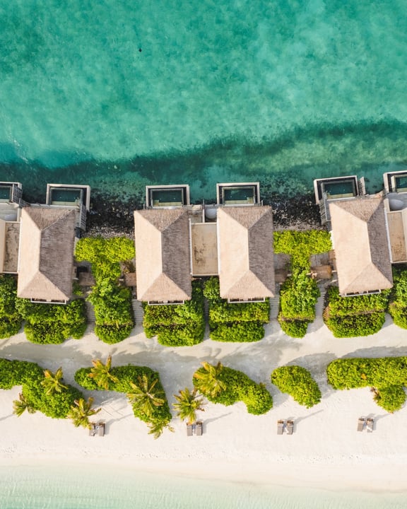 Wake up to turquoise views and endless possibilities in our Lagoon Pool Villa. Step through glass doors into elegant comfort or share a poolside breakfast overlooking the ocean. Later, take your time 