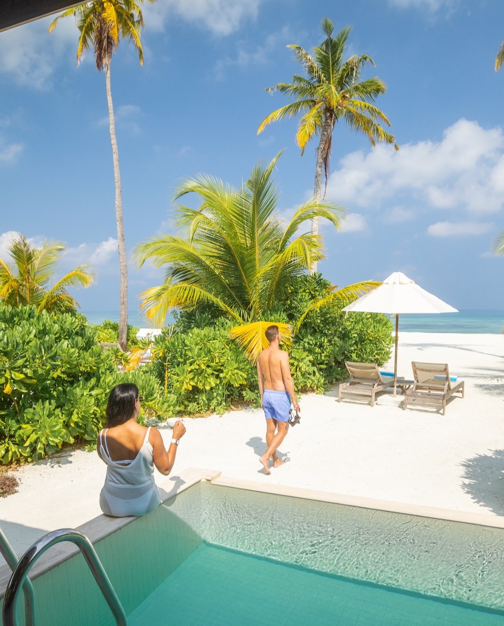 Photo by Jawakara Maldives in Jawakara Maldives. May be an image of chaise longue, pool, palm trees, cabana and text.