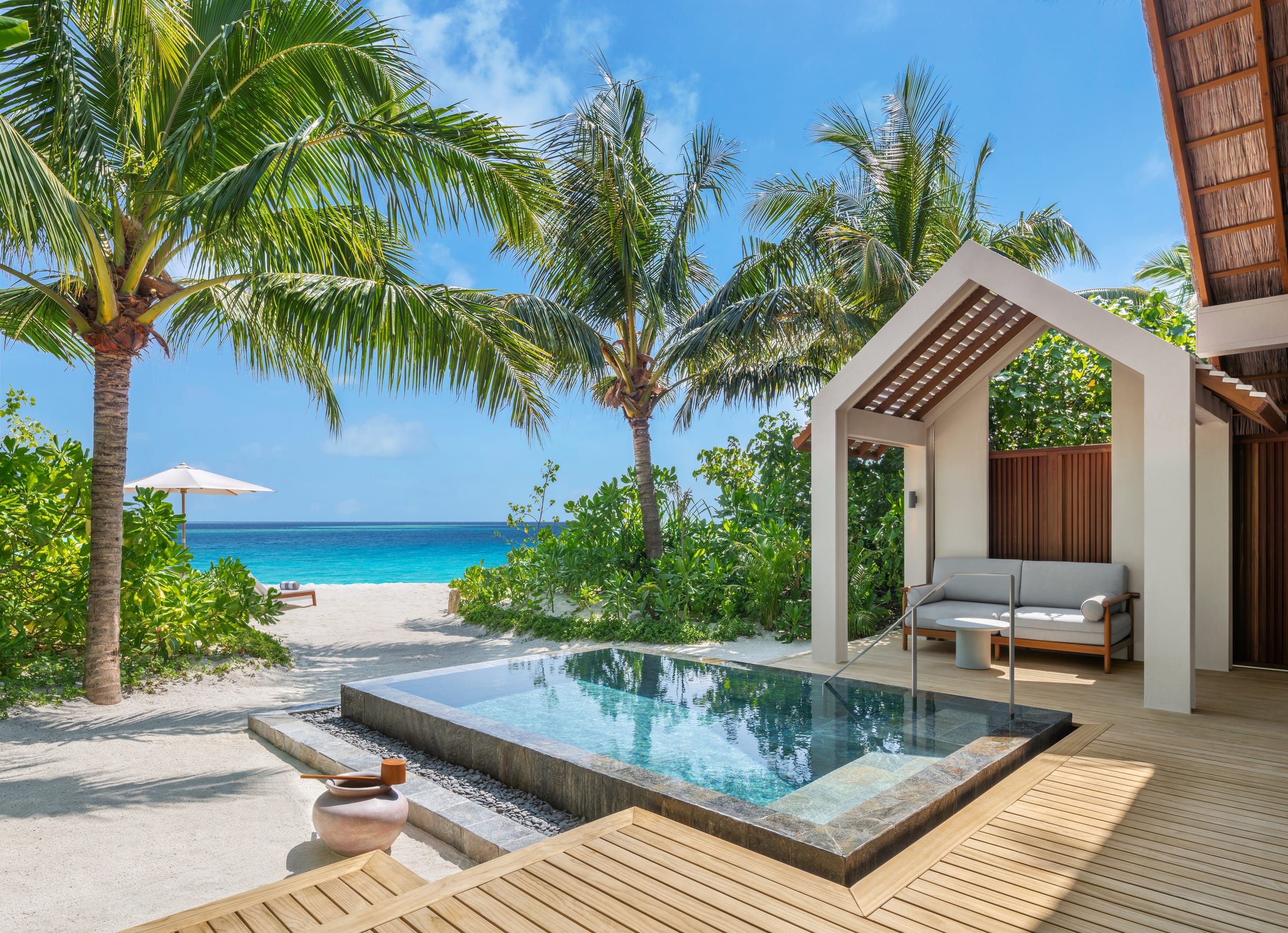 Marina Beach Pool Villa pool deck at JW Marriott Maldives Kaafu Atoll Island Resort