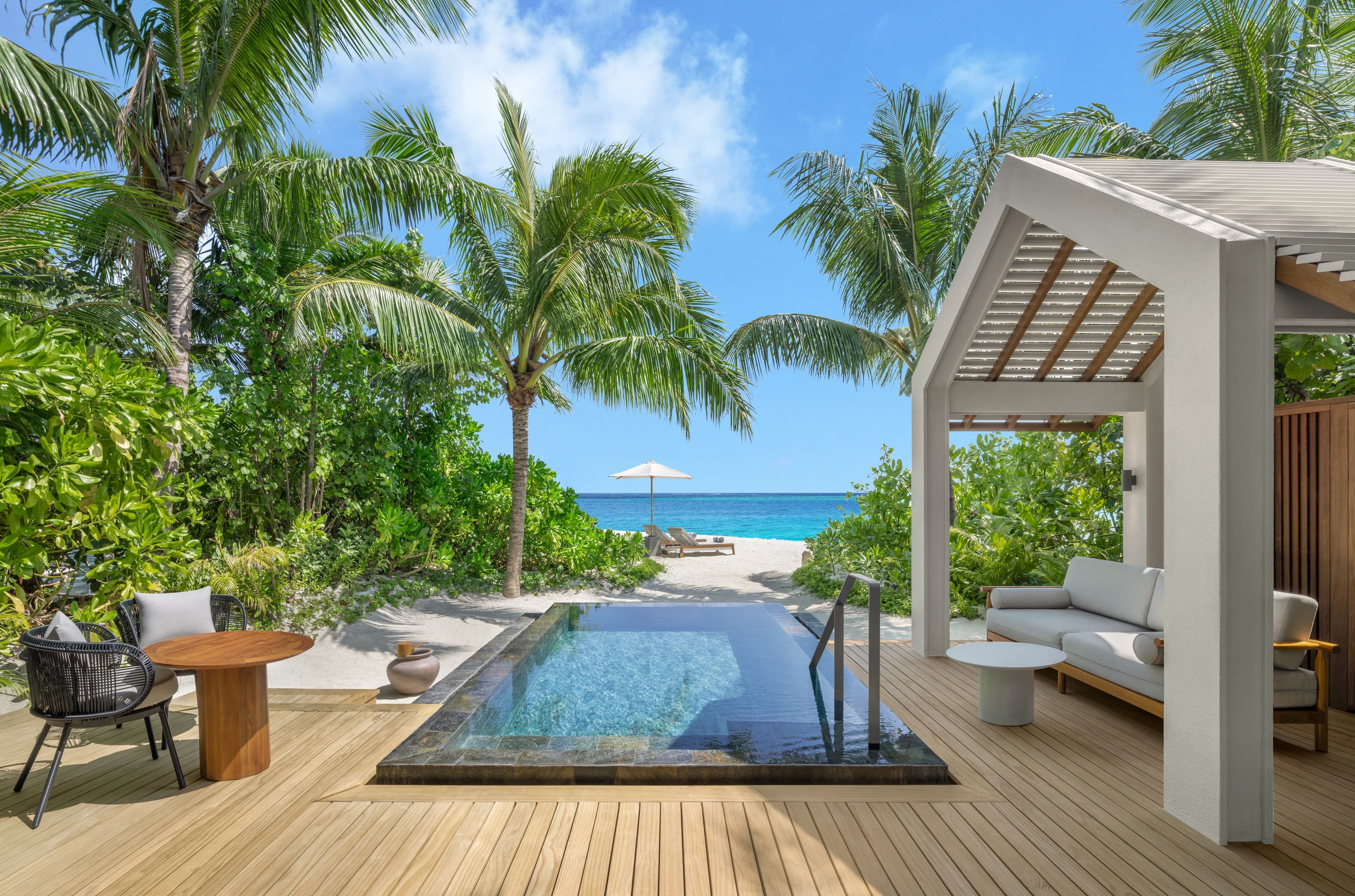 Beach pool villa deck and private pool at JW Marriott Maldives Kaafu Atoll Island Resort