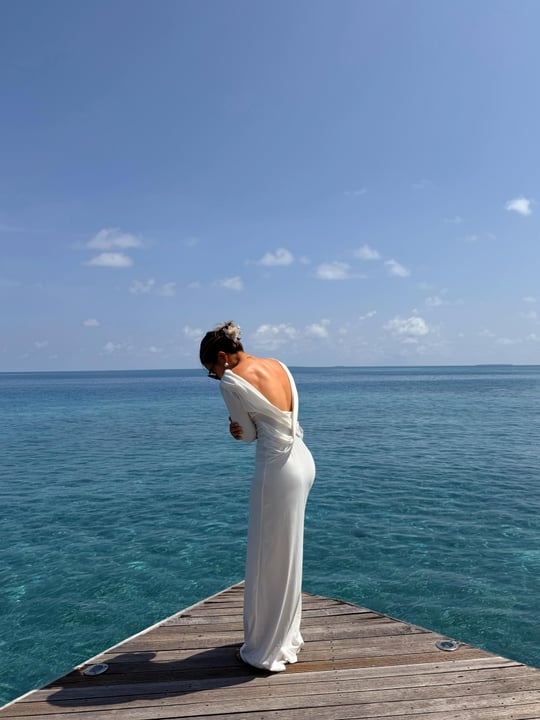 Photo by JW Marriott Maldives Resort & Spa on June 16, 2026. May be an image of gown, ocean, wedding, horizon and text.