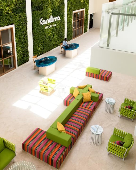 Photo by Kandima Maldives on May 02, 2026. May be an image of sofa, chaise longue, armchair, indoors, living room and text.