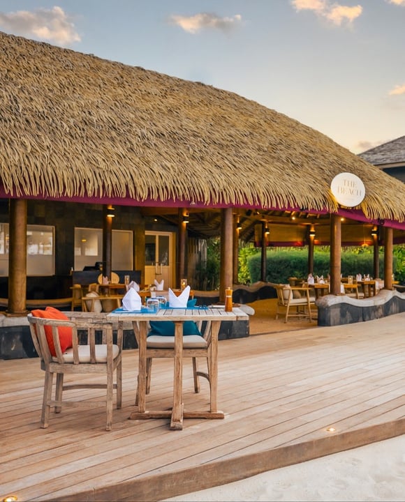 Photo by Kuredu Island Resort & Spa in Kuredu Island Resort. May be an image of one or more people, outdoors, cabana and text.