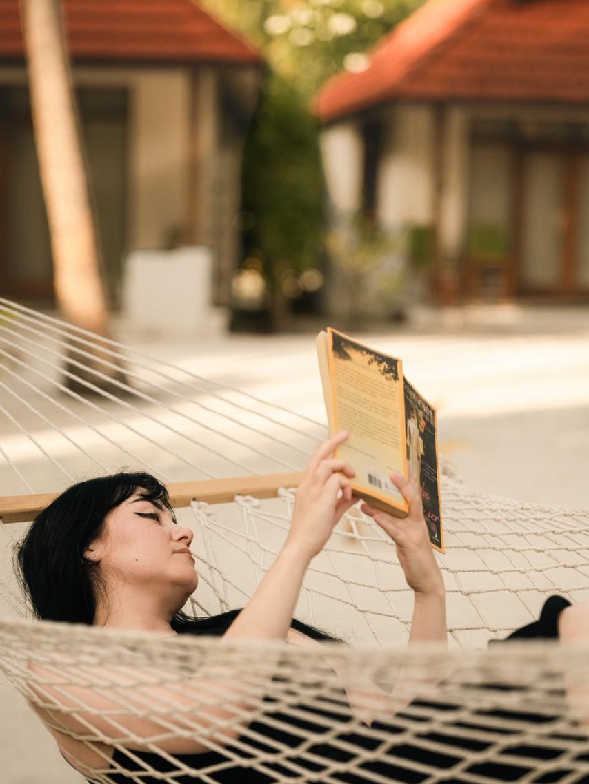 Photo shared by Niva Kurumba Maldives on June 13, 2026 tagging @globalwellnessday.maldives. May be an image of hammock, chaise longue, book, deck chair and text.