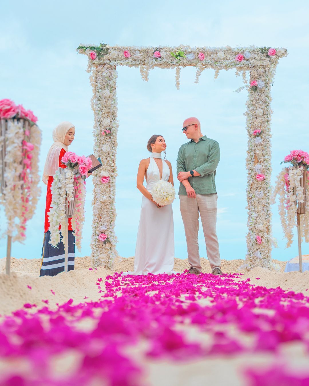 Photo by Lily Beach Resort & Spa on August 04, 2026. May be an image of flower, wedding and text.