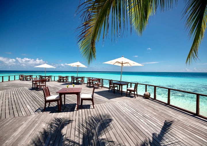 Foto von Makunudu Island vom 15. Juli 2026. Könnte ein Bild von Liegestuhl, Chaiselongue, Ozean, Strand, Horizont, Cabana und Text sein.